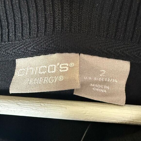 Chicos Zenergy Womens Size 2 US 12/14 Cut Out Knit Top Black Long Sleeve NWT - Picture 8 of 8